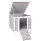 Grey wooden outdoor small animal hutch with hinged open roof and built-in ramp entrance