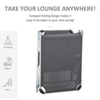 Dark gray folding sun lounger with aluminum frame, compact design, pillow