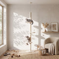 Beige cat tree with stacked perches and sisal scratching posts, cats lounging nearby