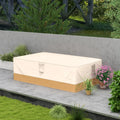Beige rectangular garden furniture cover with corner tabs over outdoor seating.