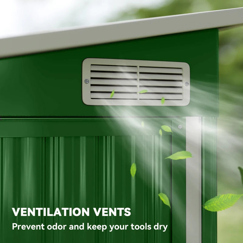 Green metal shed front with ventilation vents above lower paneling