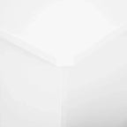 White radiator cover corner close-up with smooth top edge and side support.