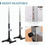 Height-adjustable squat rack showing adjustable holes, black legs, silver uprights, and arms.