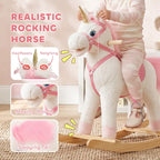 White plush unicorn rocking horse with pink bridle, horn, and fluffy pink tail