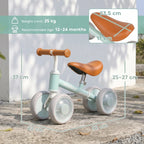 Green toddler balance bike with orange seat and four silent EVA wheels, adjustable height