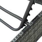 Close-up of outdoor sofa corner with metal frame and woven wicker panel