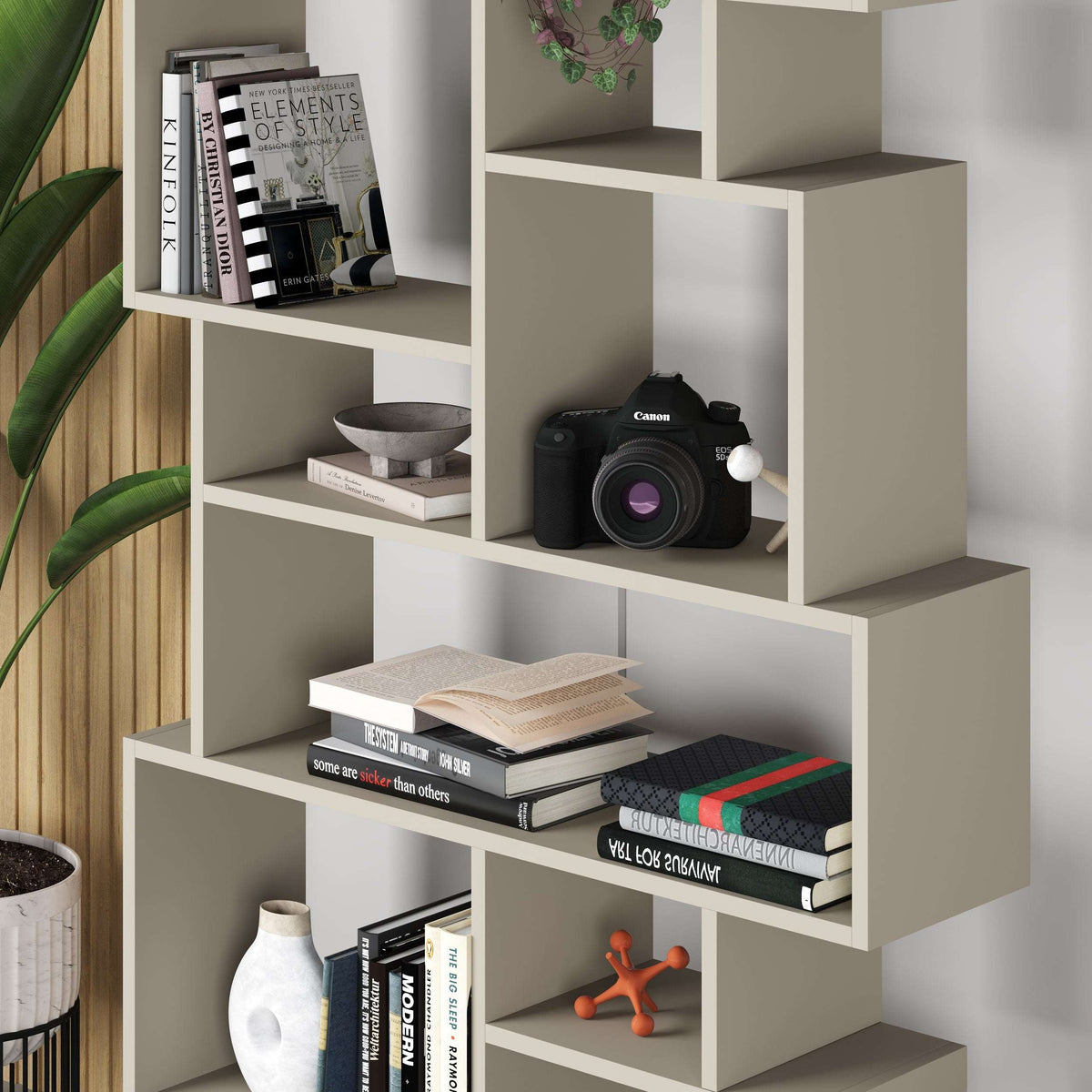 Tall bookcase display unit detail with open cubby shelves, white finish