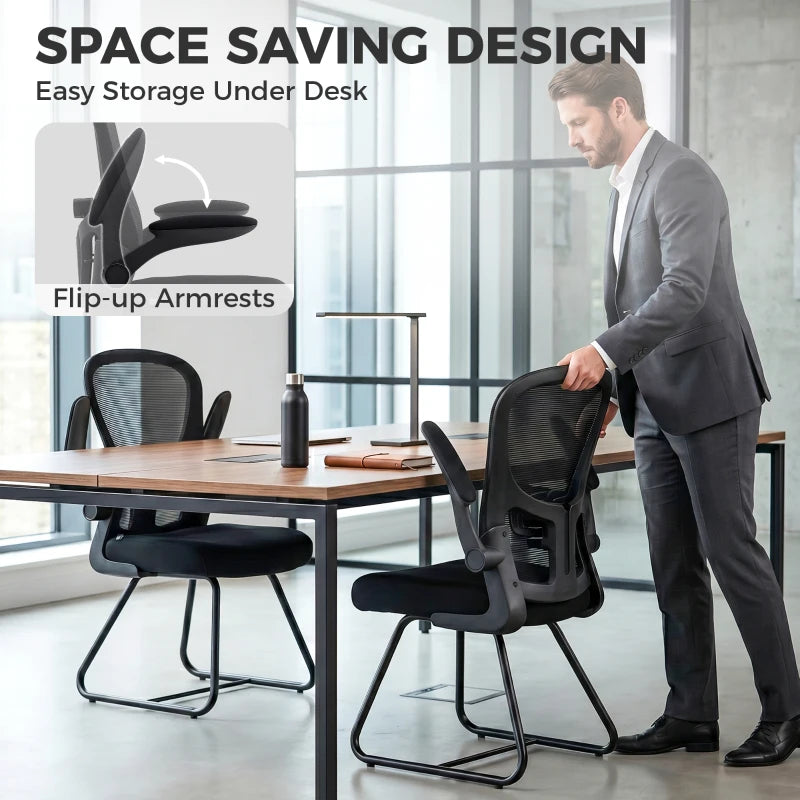 Black reception chair with flip-up armrests and mesh back, metal frame