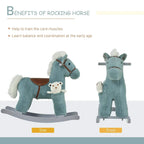 Blue plush rocking horse toy with brown saddle and white bear plush buddy