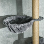 Grey plush hammock bed attached to a tall cat tree post