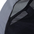 Close-up of grey and black bike pet trailer fabric with zipper and mesh panel