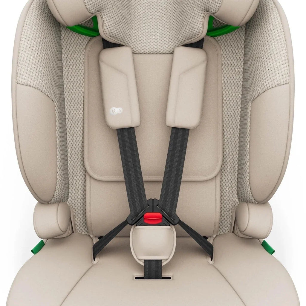 Beige child car seat harness straps and central buckle pad