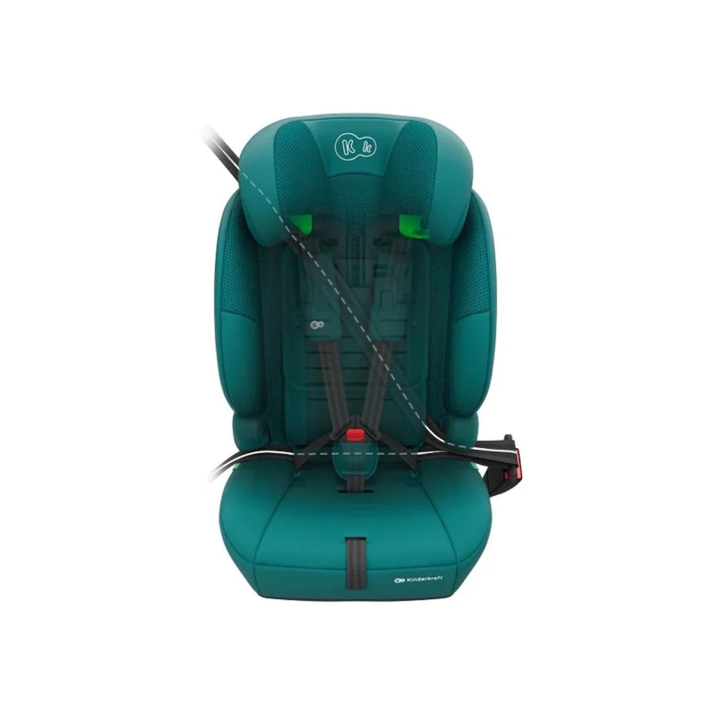 Green car seat with top harness straps visible and padded seat cushion.