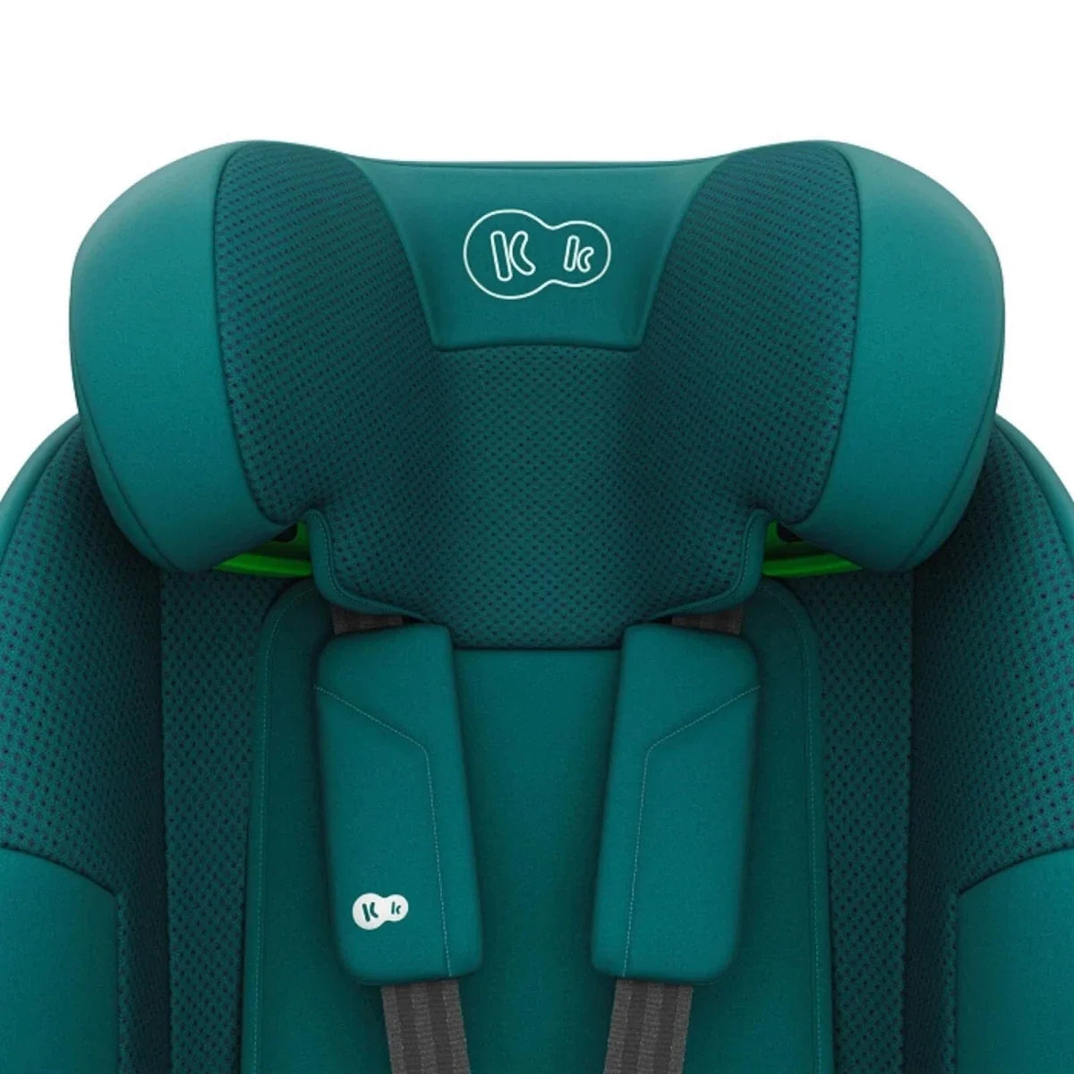 Green car seat close-up of backrest padding and headrest support wings.