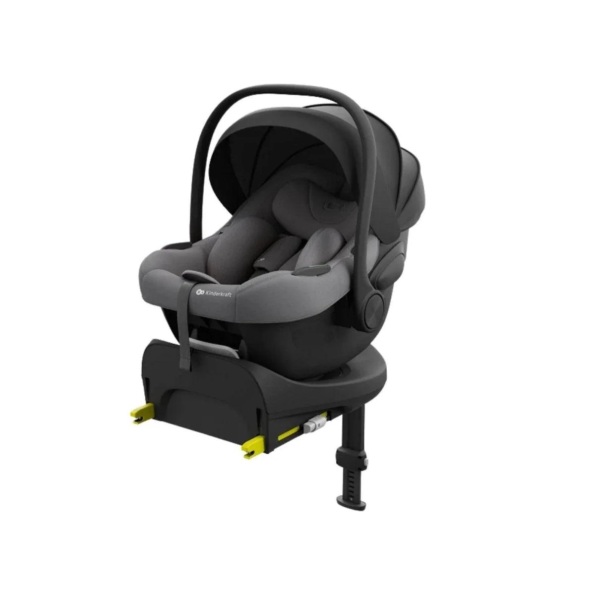 Grey child car seat with curved handle, side padding, and padded headrest