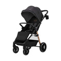 Midnight black toddler stroller with canopy, padded seat, and 4-wheel frame