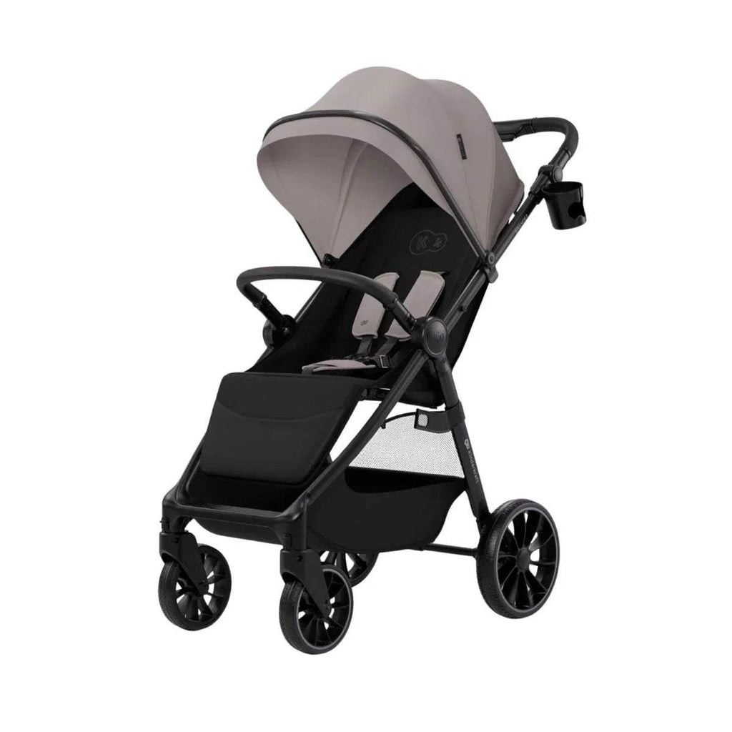 Sand beige stroller with canopy and black seat, compact 4-wheel design