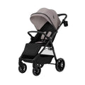 Sand beige stroller with canopy and black seat, compact 4-wheel design