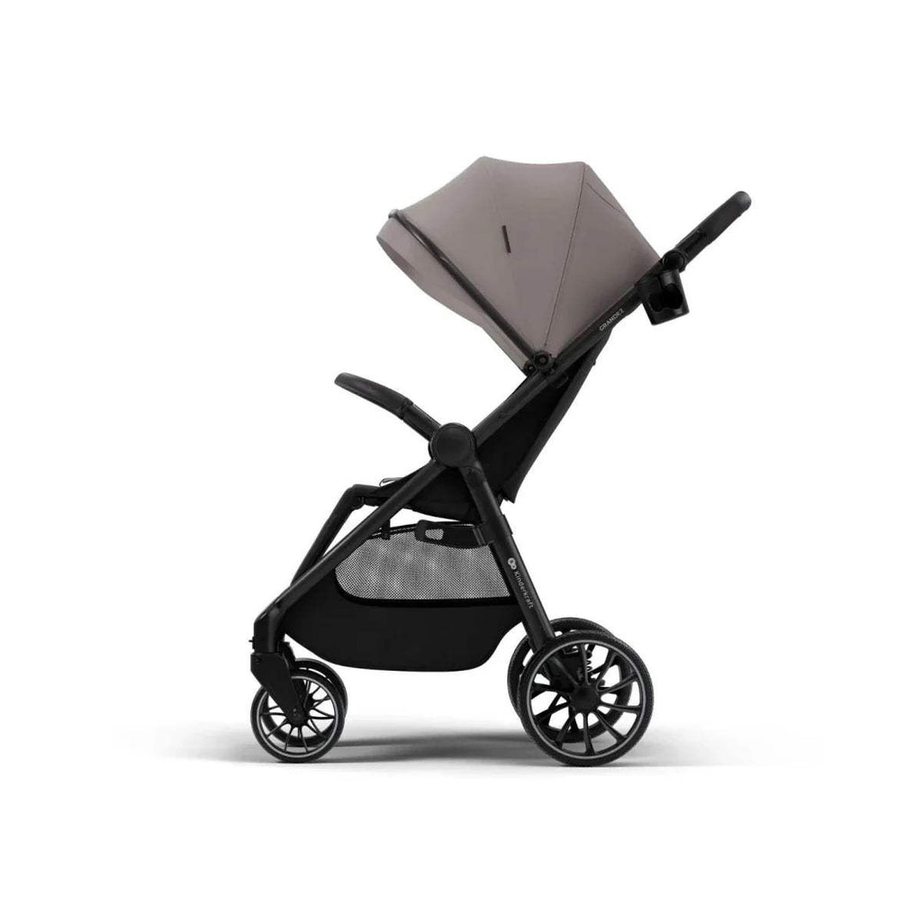 Sand beige stroller seat with large canopy, black frame and front swivel wheels