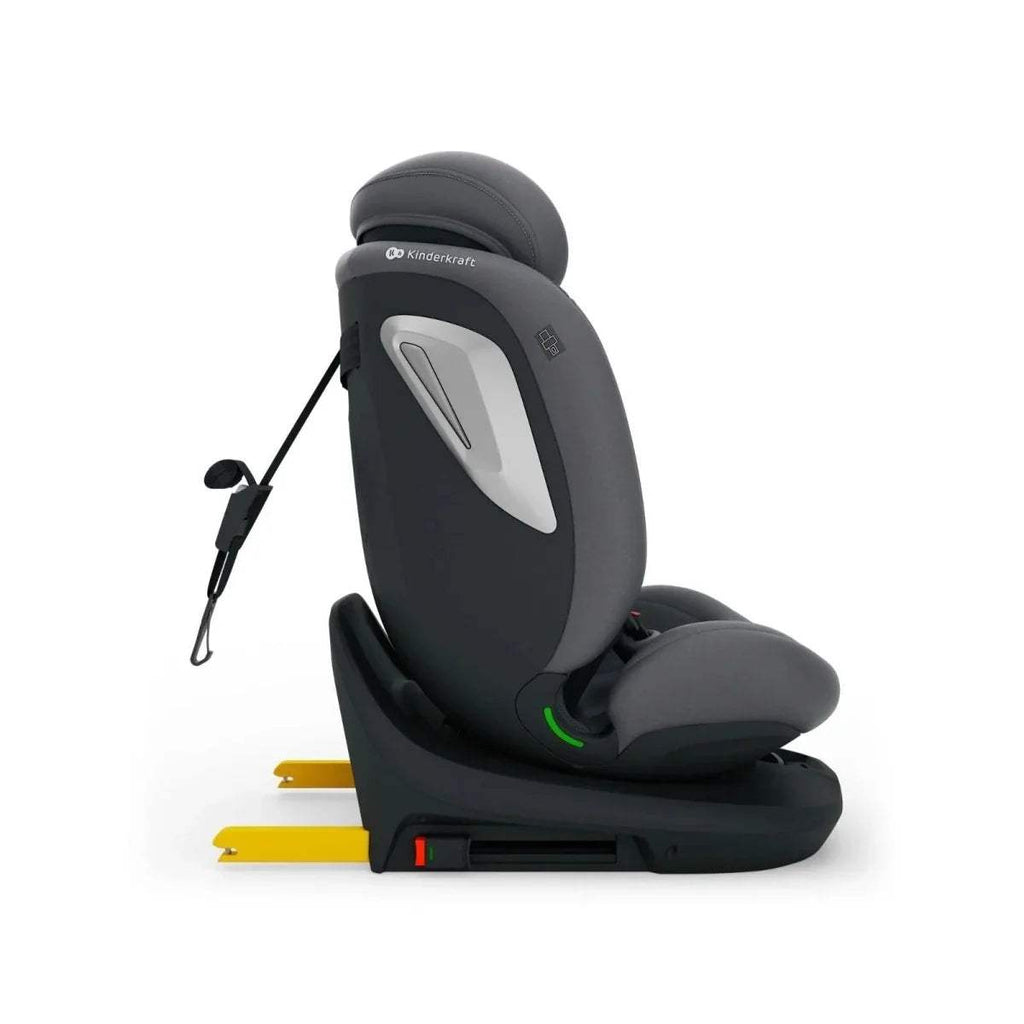 Grey car seat, side view with integrated shoulder shield and harness