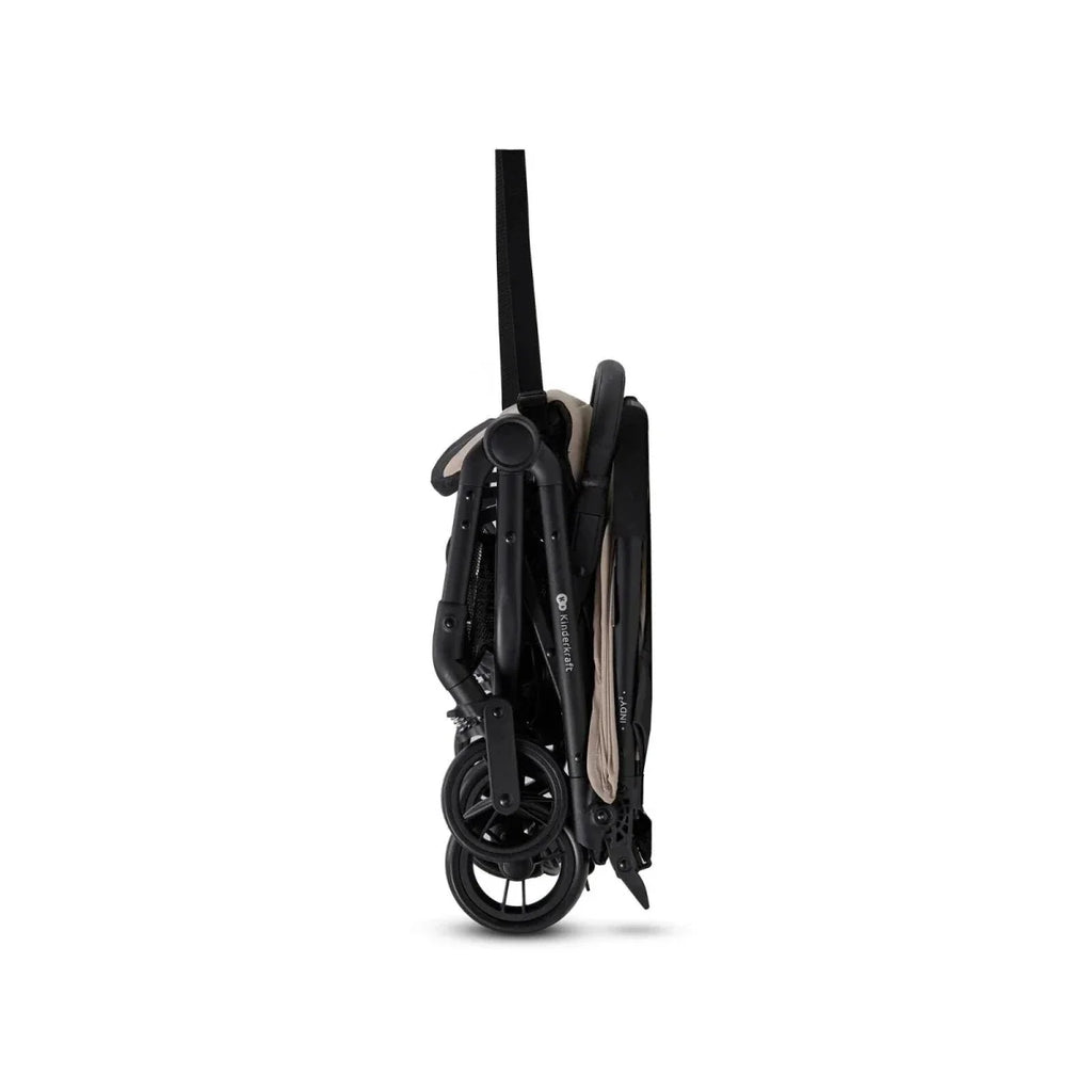 Kinderkraft Indy 3 stroller folded in black with compact wheels and stand