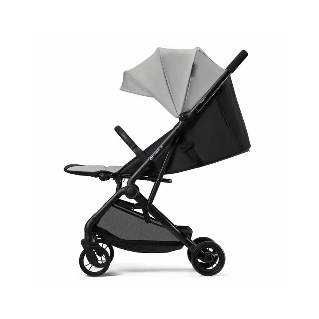 Grey stroller with black frame and canopy, angled side view with large rear wheels