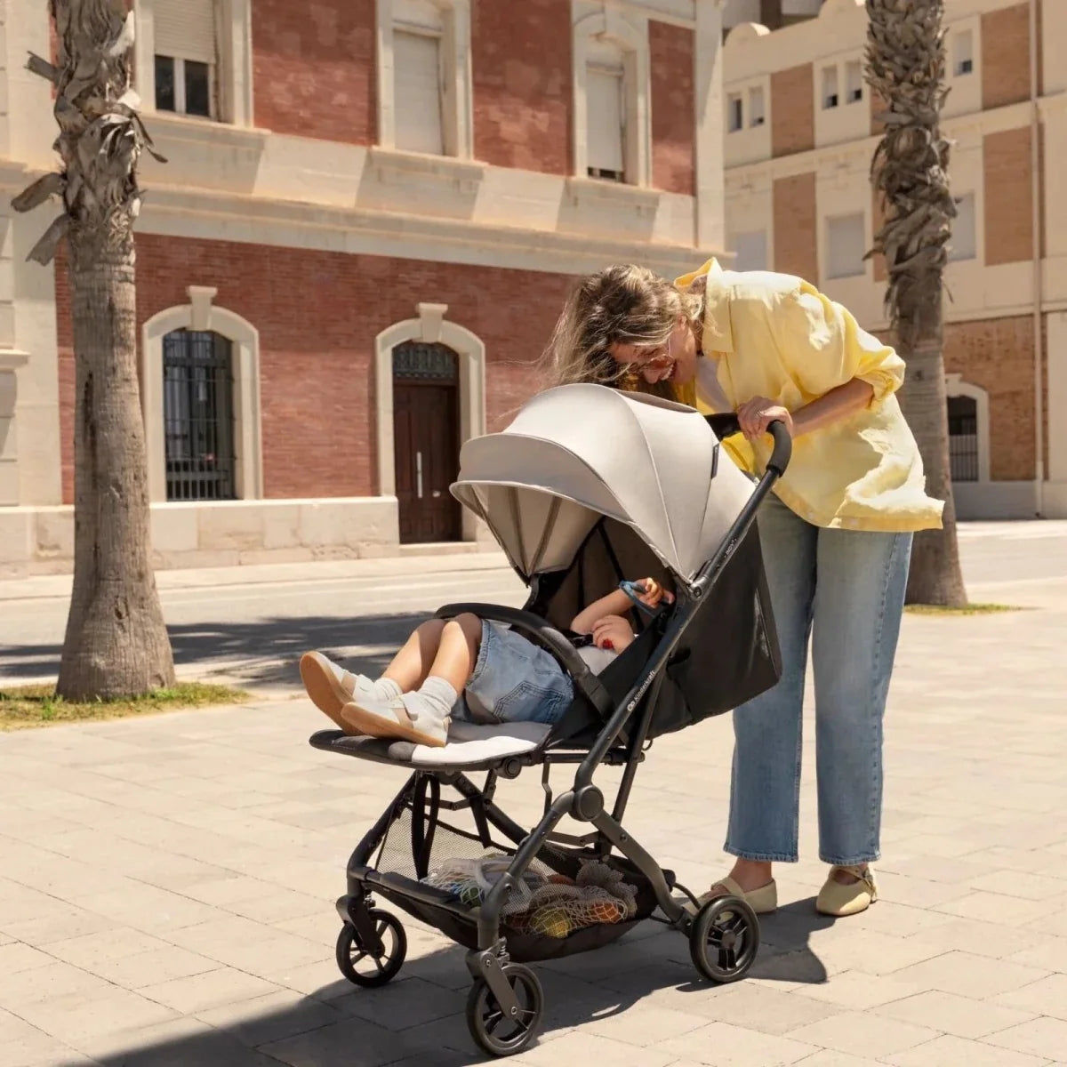 Kinderkraft Indy 3 stroller, Urban Grey with reclining seat and five-point wheels