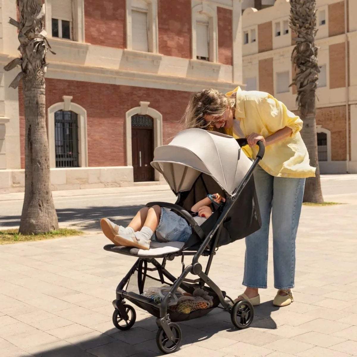 Coal Black stroller with canopy and reclining seat, front-side view