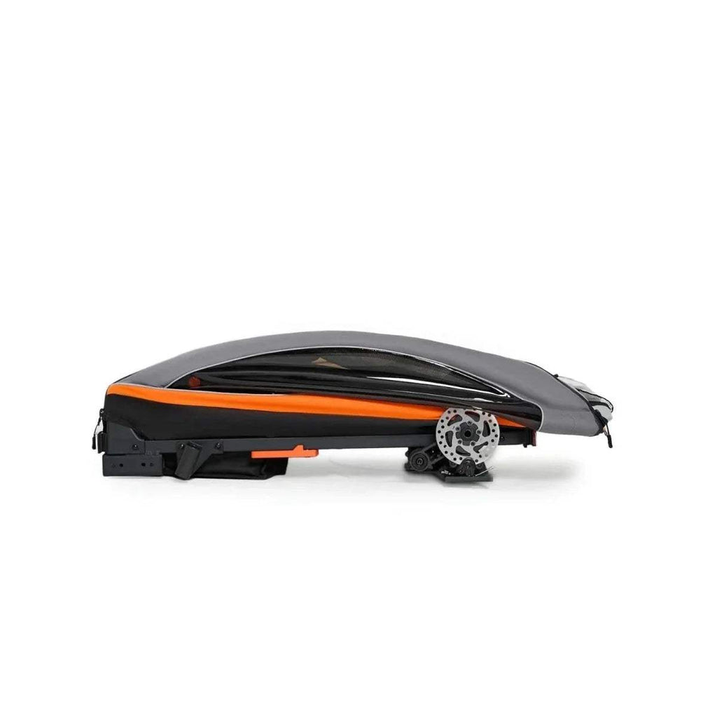 Orange-and-black stroller side view with extended wheel base and canopy cover