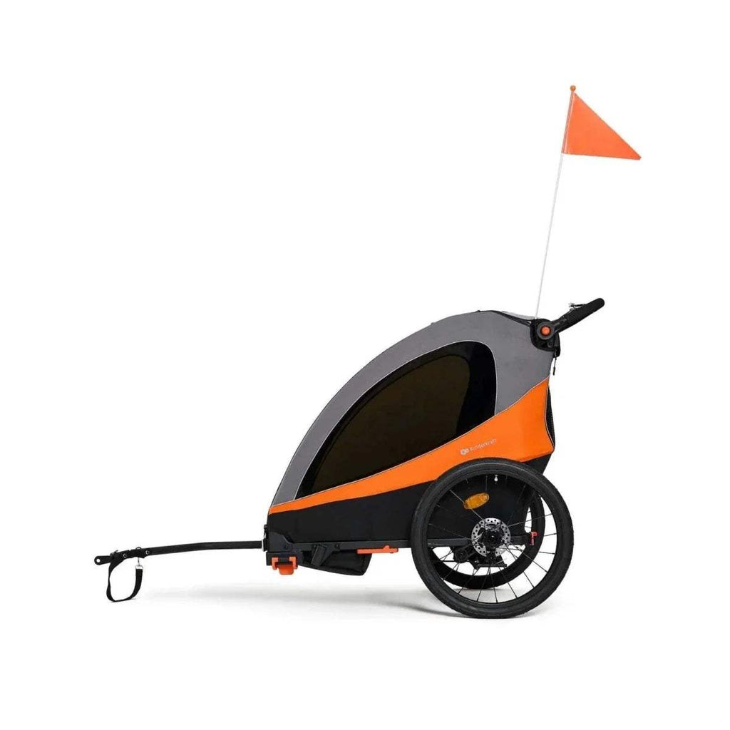 Orange and black stroller with canopy, long handle bar, and large rear wheels