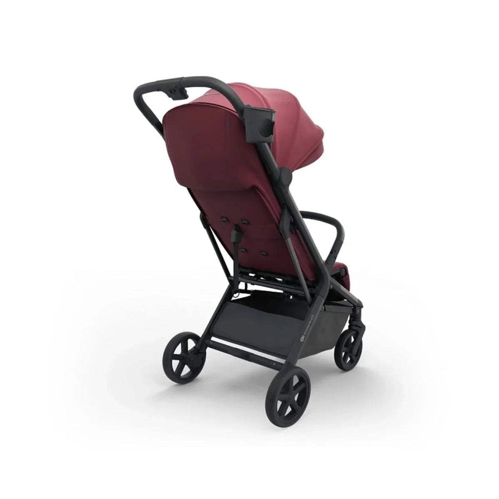 Dark ruby stroller with black handlebar, canopy, and angled seat view