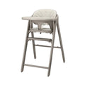 Beige 3-in-1 high chair with padded seat and backrest, and safety harness