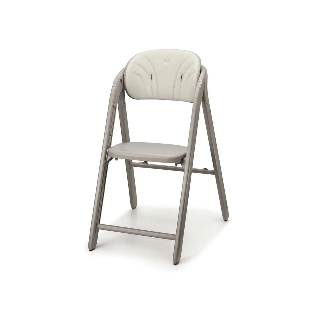 Beige 3-in-1 high chair with cushioned seat and curved backrest detail