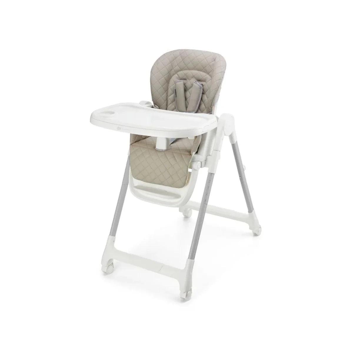 Beige 3-in-1 high chair with white tray and padded seat in a side profile
