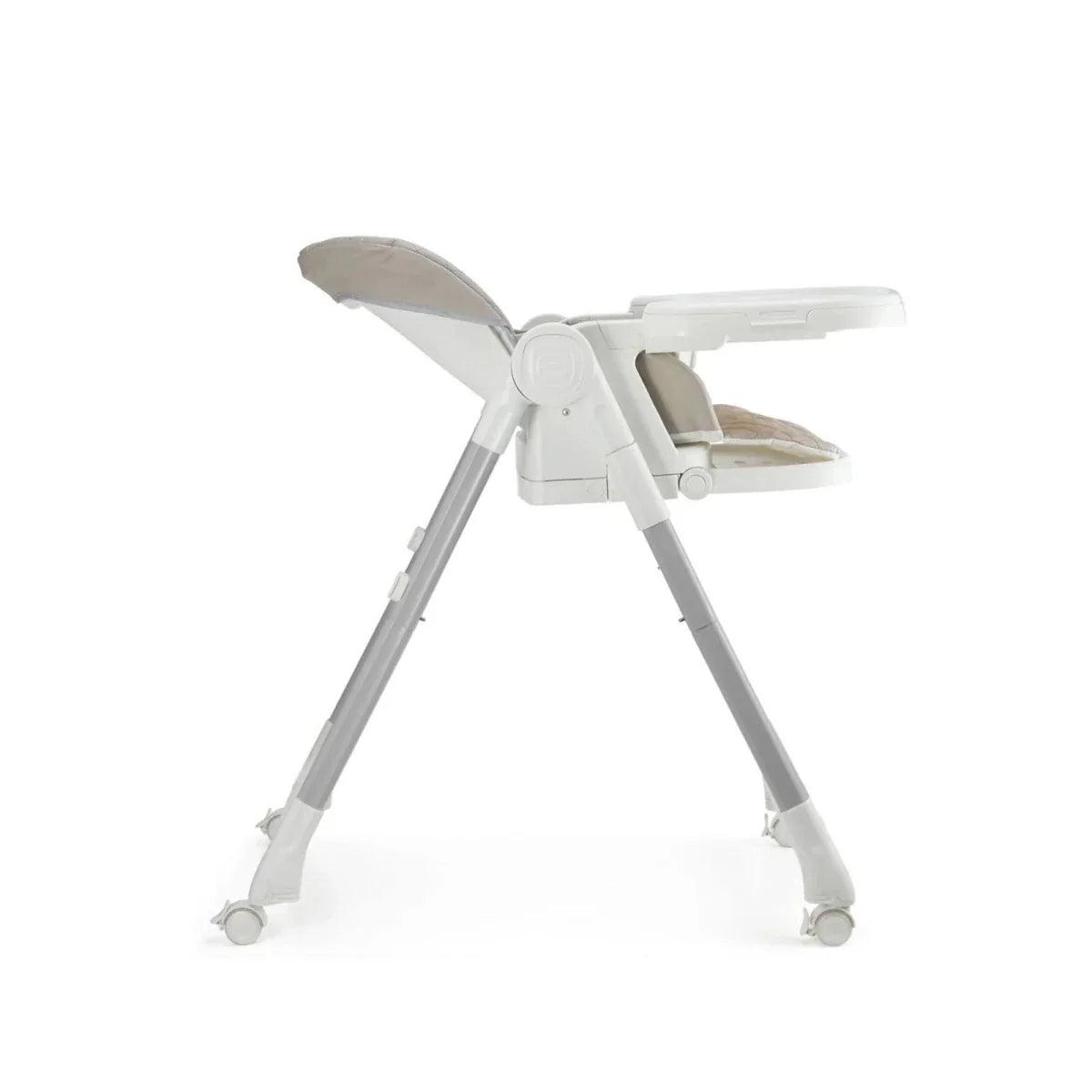 Beige 3-in-1 high chair in angled side view with footrest and wide base