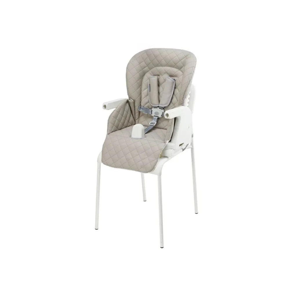 Beige high chair with quilted seat pad, safety harness, and adjustable front tray