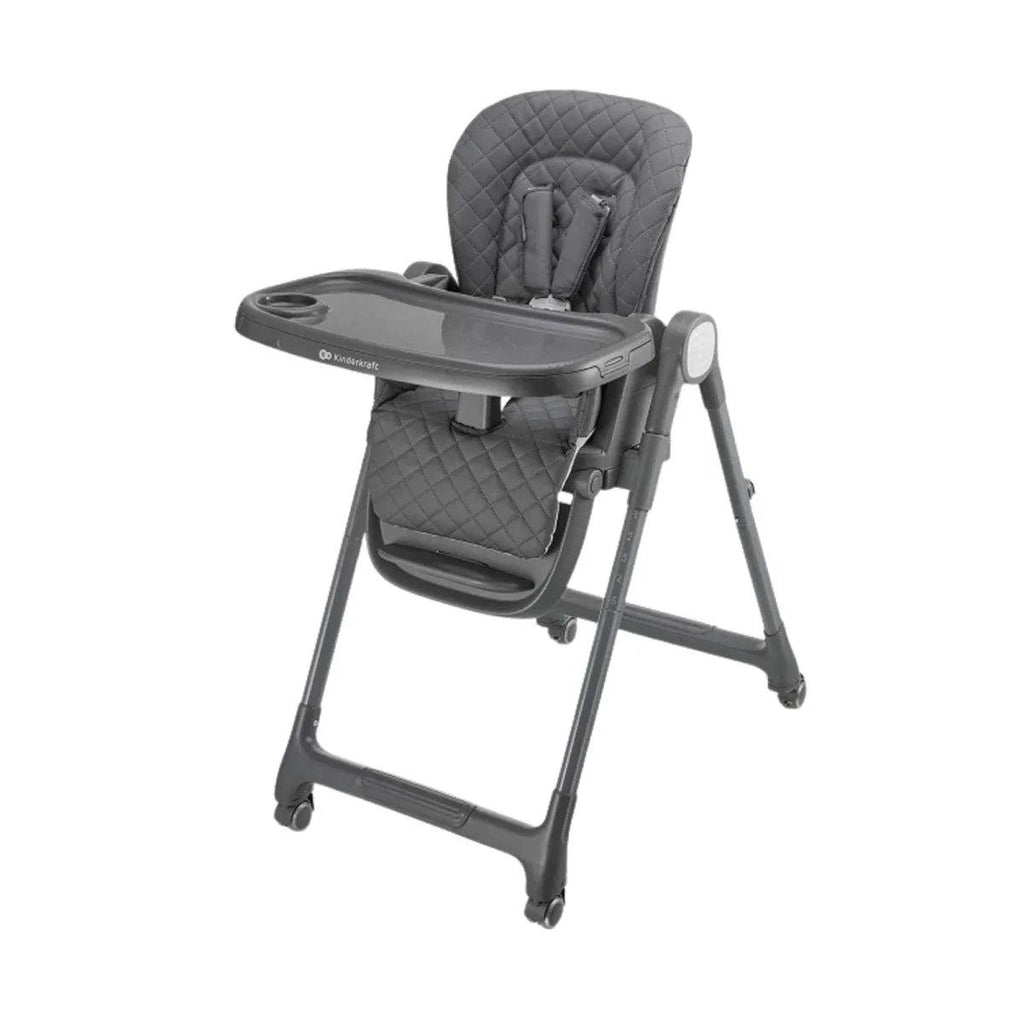 Grey padded high chair with safety harness, tray table, and adjustable footrest