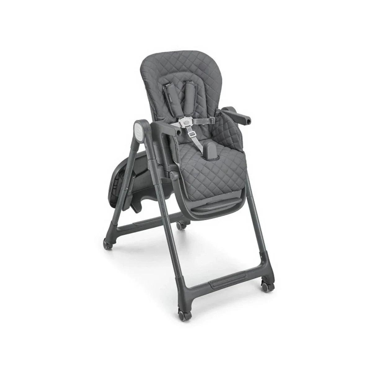 Grey high chair with quilted seat, harness straps, and front footrest