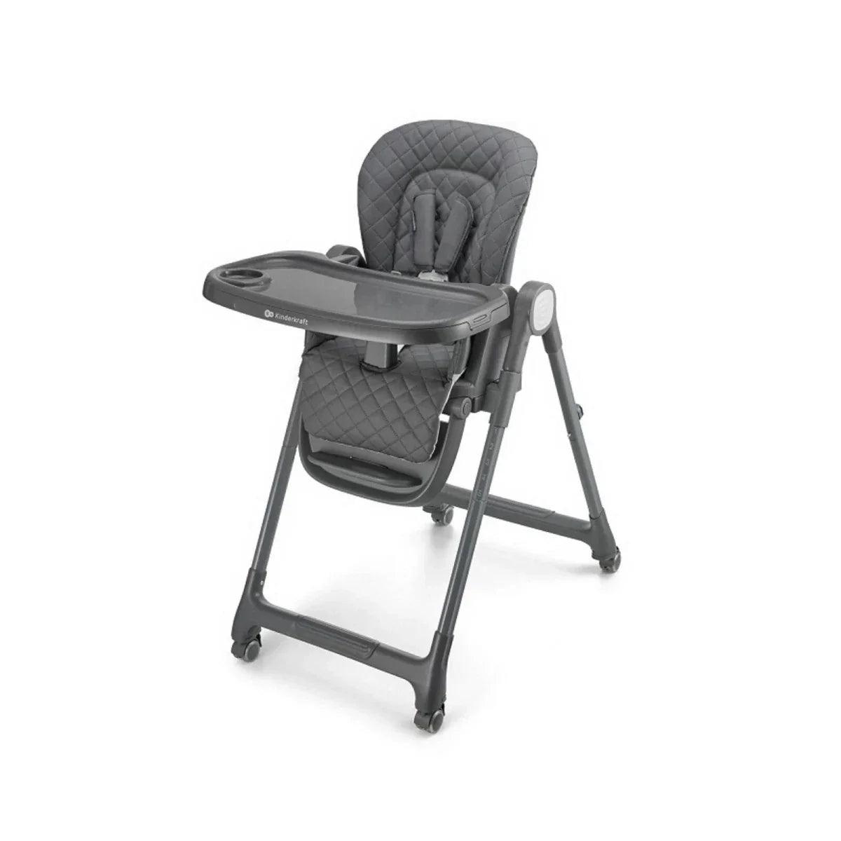 Grey padded high chair with tray table and safety harness straps
