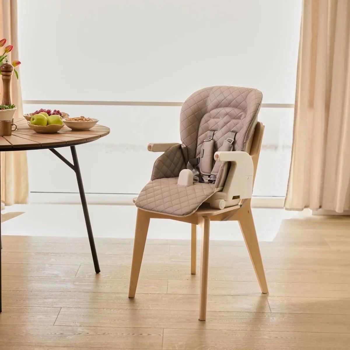 Beige 3-in-1 high chair with quilted seat pad and tray table