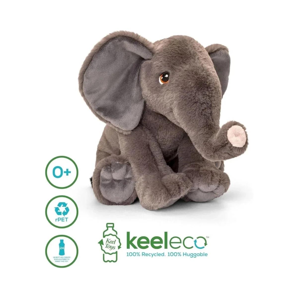 Gray plush elephant stuffed toy with floppy ears, amber eye, and round soft feet.
