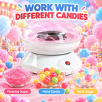 White electric cotton candy maker with clear bowl and black center heating plate