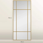 Gold-tone vertical grid wall mirror with rectangular frame and reflective glass panels.