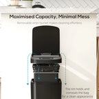 Black sensor trash bin with open lid showing inner bin and bag-conceal rim