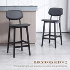 Black bar stools set of two with faux-leather seats and sturdy footrest bars
