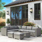 Grey PE rattan corner sofa set with cushions and matching coffee table plus footstools