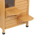 Outdoor wooden cat house close-up of side steps, corner perch, and arched lower entrance
