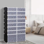 Modular shoe rack cabinet with gray cube drawers and black side panels in an entryway