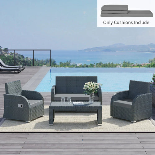 Dark grey seat cushion pads on outdoor rattan furniture, cushioned seating surfaces