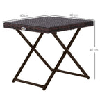 Small square brown rattan coffee table with woven top and folding X-frame base